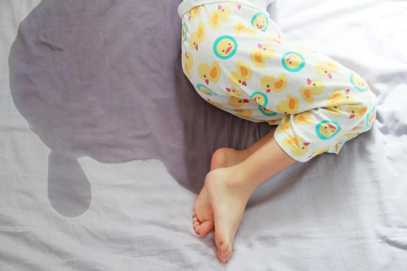 Can cutting back on caffeine help manage bed-wetting in children?